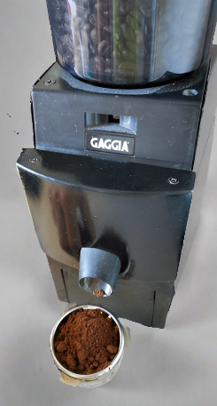 Gaggia MDF non-dosing mod. Are you tired of the dosing mechanism of the Gaggia MDF because it spills alot of coffee outside the basket. So use this non-dosing mod. You need to remove the entire doser mechanism and saw away the front part of the grinder. Fortunatly it's made of brittle plastic which is super easy to cut and file. Then push the funnel on to the grounds outlet and put the cover on. Mark the s