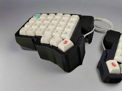 Specialized keyboard with white keys on a black background