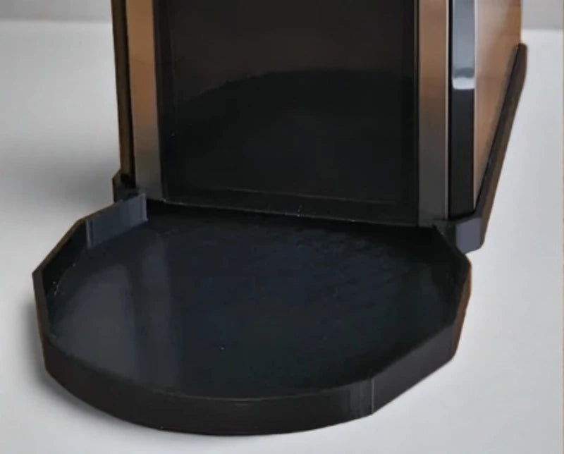 This is a tray for the DeLonghi KG89 coffee grinder. The KG89 is a very messy grinder and each time you pull out or insert the container for the ground coffee it'll spill some coffee powder and mess up your kitchen. Designed so that the grinder doesn't slide around inside the tray This tray will catch that powder so you can just empty it once a week/month and keep your kitchen counter clean. Comes with non-slip rubber pads around on the bottom of the tray to prevent it from moving.